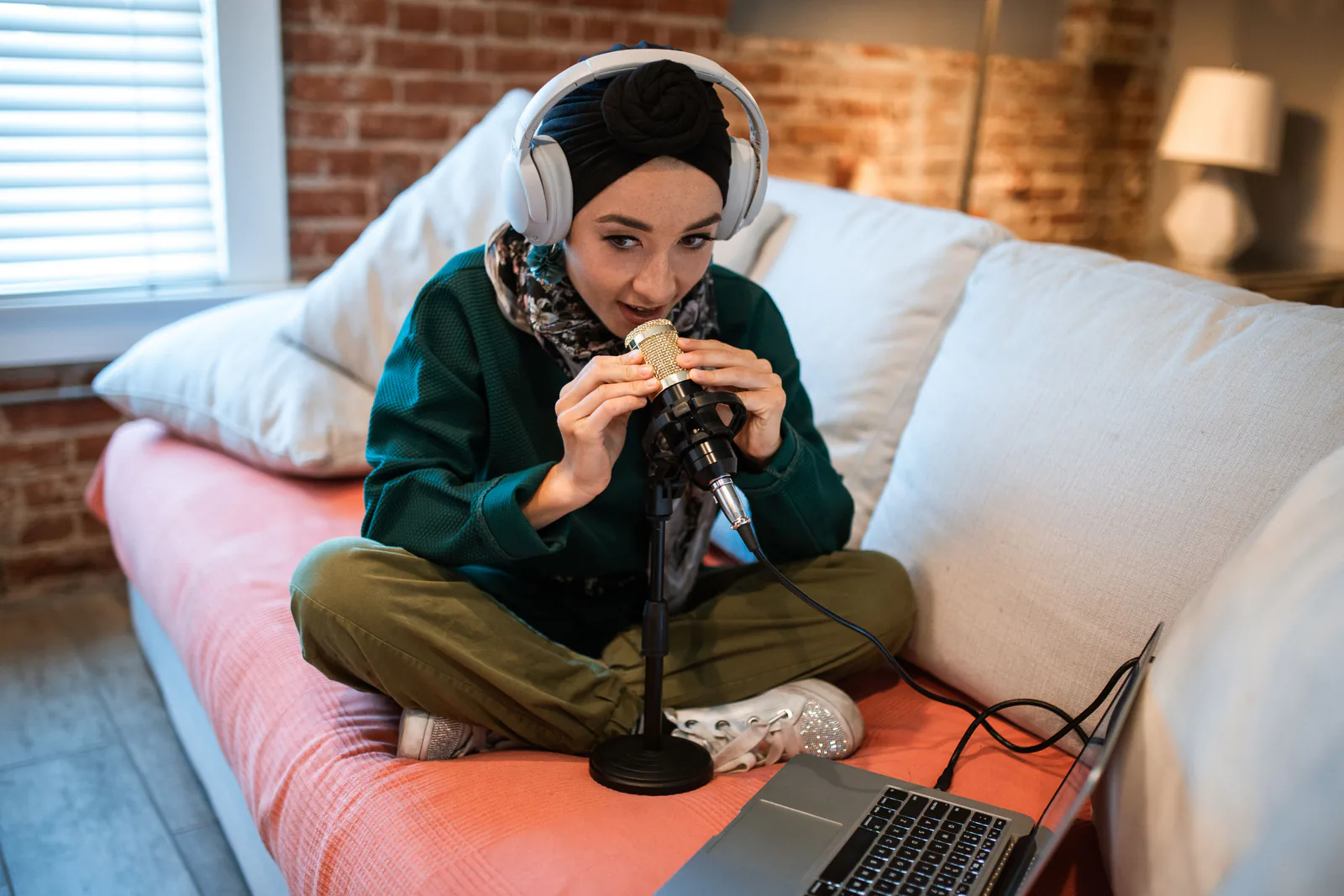 Paige recording the Divinely Unhinged podcast
